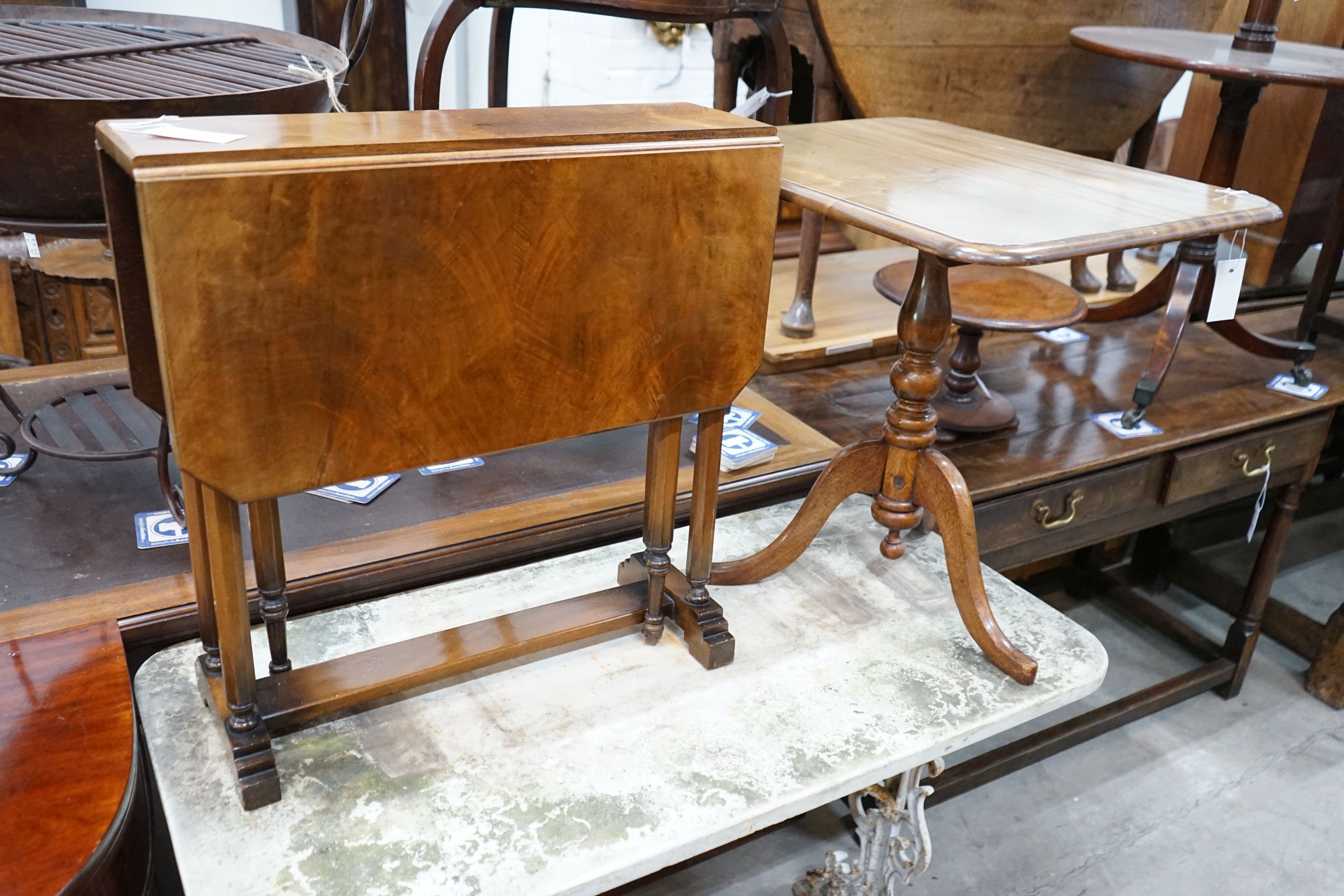 A Victorian mahogany tripod wine table, cut-down, width 60cm, height 56cm together with a Sutherland table